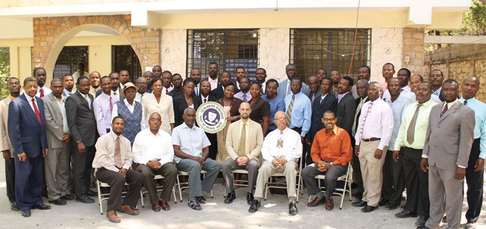 Josh Rice with students and faculty at the Church of God seminary in Haiti