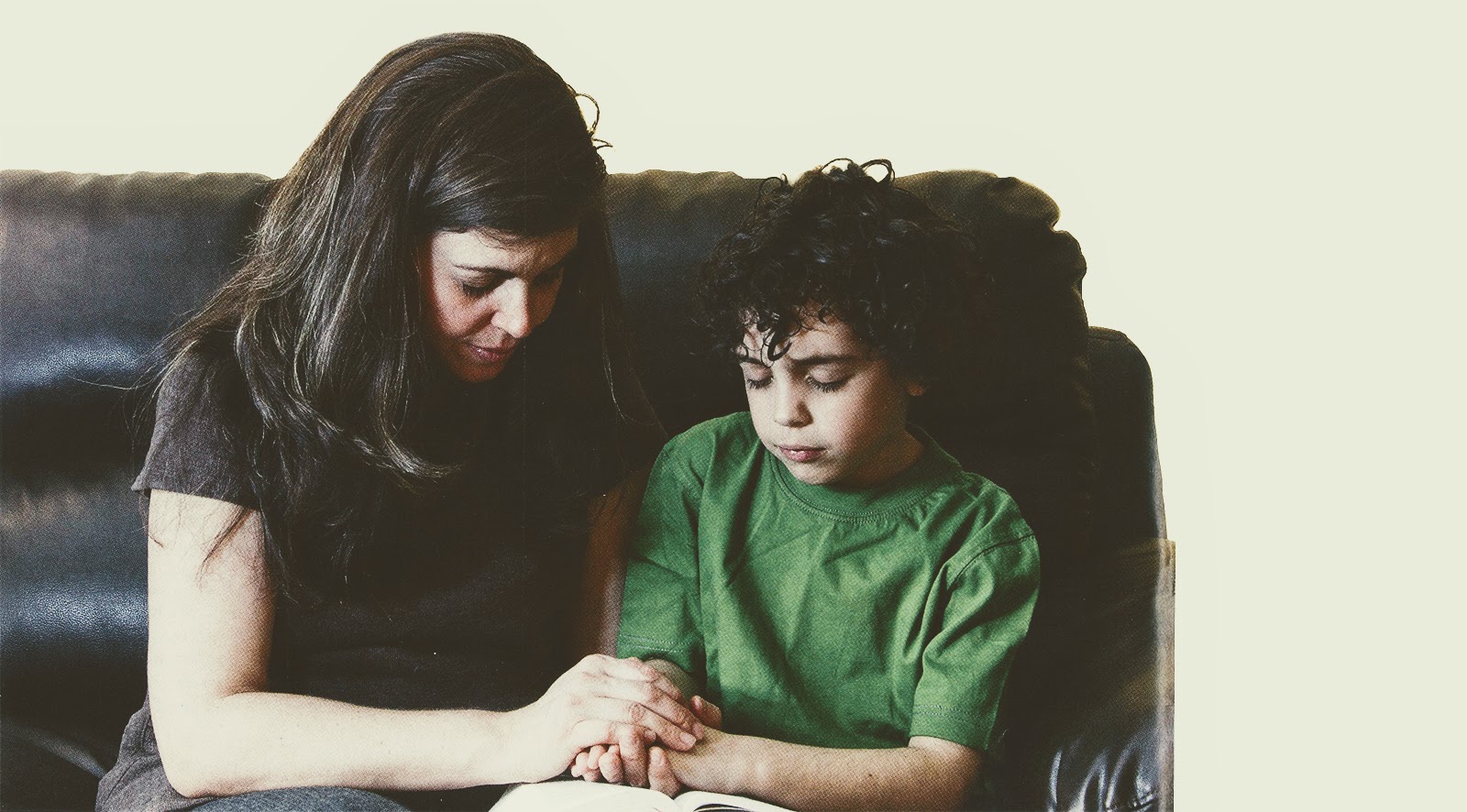 Mother and child praying